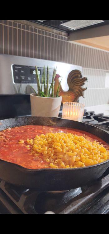 Step 1.1: Add protein pasta and Italian seasoning to the skillet