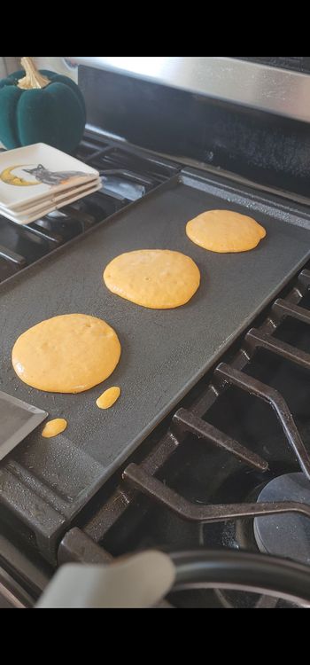 Step 1.1: Pour a small amount of batter onto the skillet to form pancakes