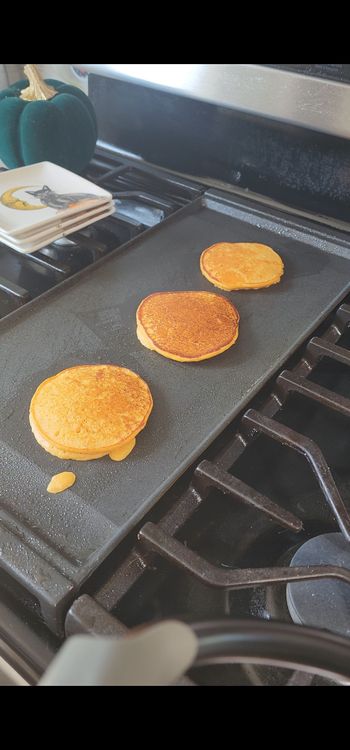 Step 1.2: Pour a small amount of batter onto the skillet to form pancakes