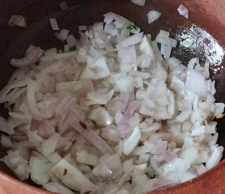 Step 2.1: Add chopped onions and sauté until they turn light brown