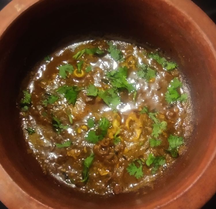 Step 2.1: Once the eggs are cooked, turn off the flame and garnish with chopped coriander leaves