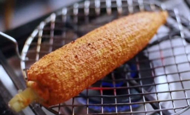 Step 1.1: Place the corn over the stove top grill