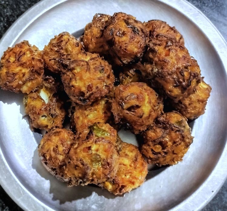 Step 2.1: When the oil becomes hot, add the balls and fry until golden brown on medium flame