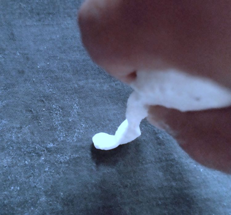 Step 1.1: Gently twist and roll the dough using your fingers to form a spiral or coil shape on a cotton cloth