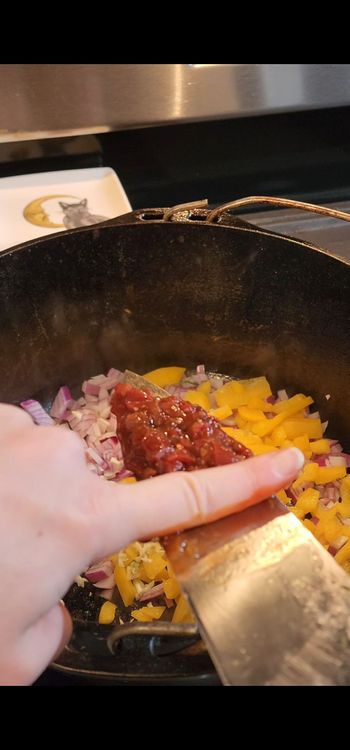 Step 1.1: Add the minced chipotle peppers in adobe sauce and stir well to combine