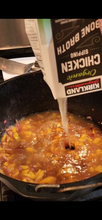 Step 1.1: Pour in the chicken bone broth, diced tomatoes with green chiles and black beans