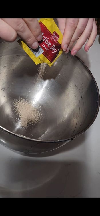Step 1.1: Combine warm water, yeast, and sugar in your biggest bowl or stand mixing bowl