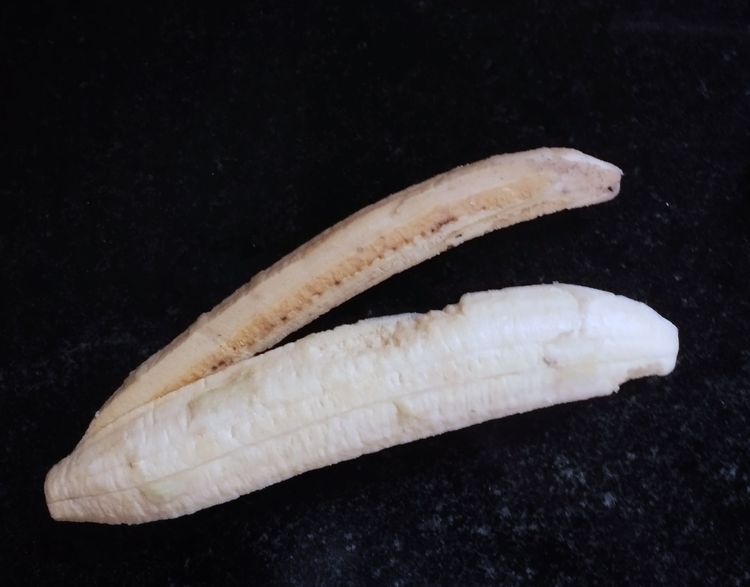Step 1.1: Peel and cut the plantain into lengthwise four pieces
