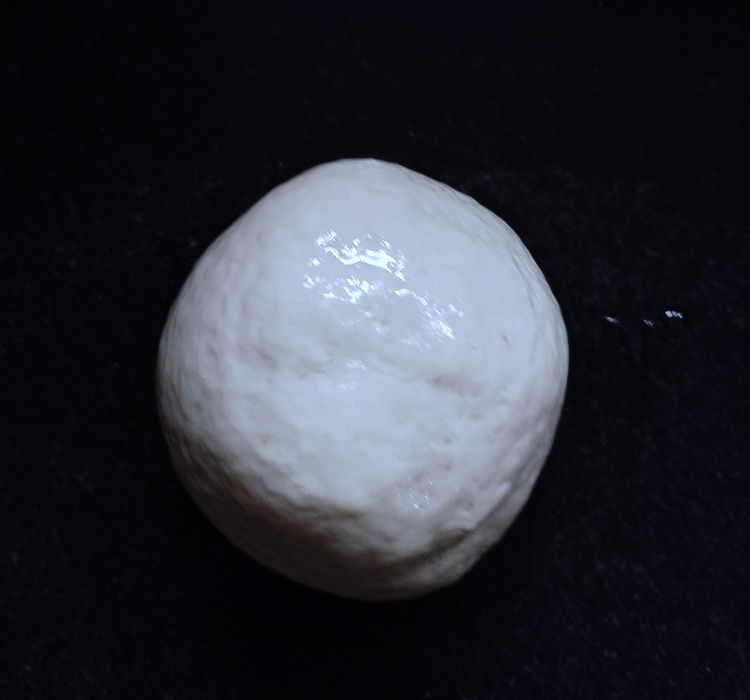 Step 1.1: Gradually add water (around 1/4 - 1/2 cup) and knead it until it becomes a soft, non-sticky dough