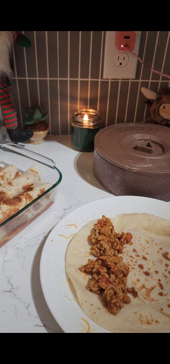 Step 1.1: Warm tortillas and fill each with chicken mixture and a small amount of cheese