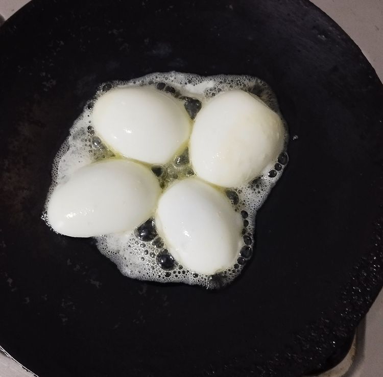 Step 1.1: Heat a tawa and add butter