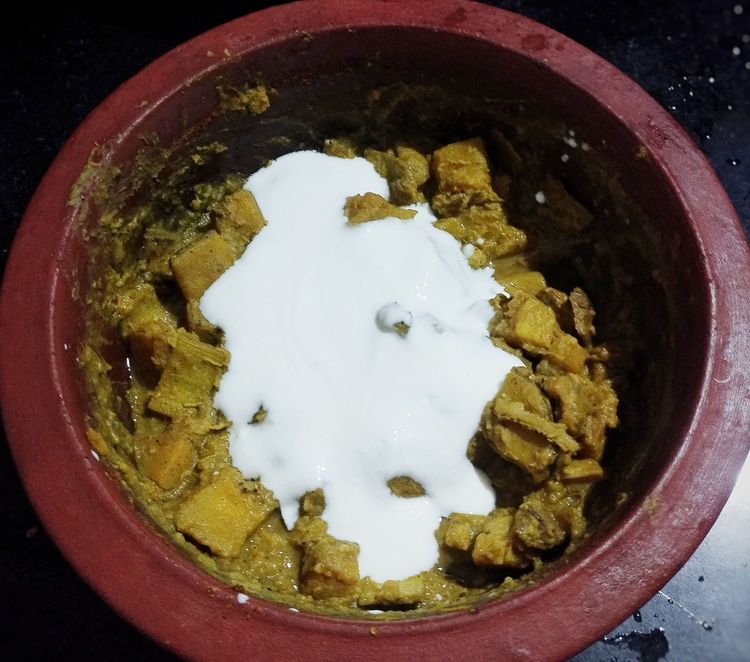 Step 2.1: Add the well-beaten curd slowly, stirring continuously to avoid curdling