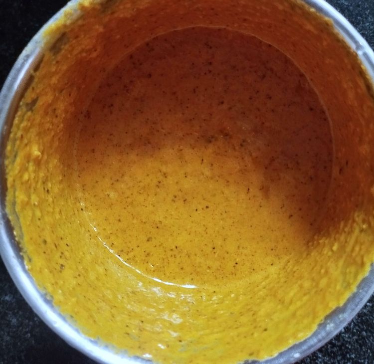 Step 2.1: Let the mixture cool, then blend with shallots (or onion) and a little water into a fine paste