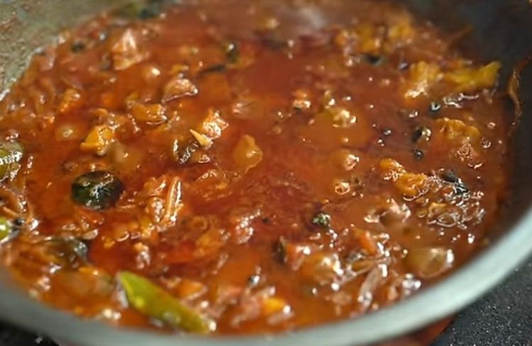Step 5.1: Cover and cook on medium to low flame for 5–6 minutes, stirring occasionally until it becomes a semi-thick gravy