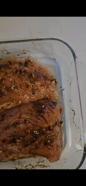 Step 3.1: Rub the marinade all over the turkey tenderloins, ensuring they are evenly coated
