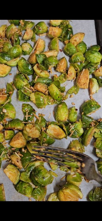 Step 3.1: Spread the Brussels sprouts in a single layer on the baking sheet, cut side down