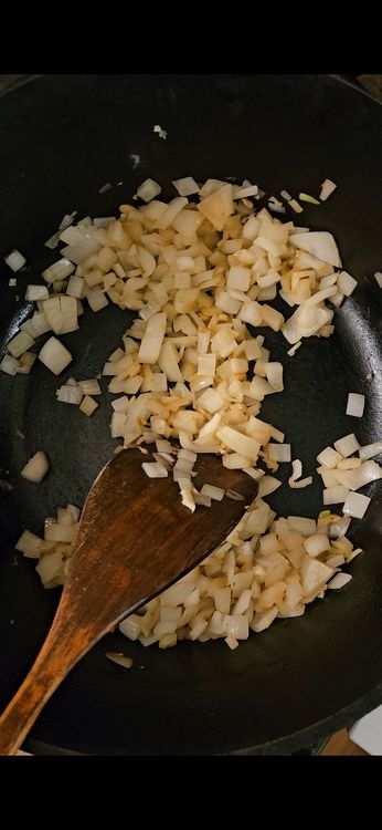 Step 1.1: Heat olive oil or butter in a large pot over medium heat