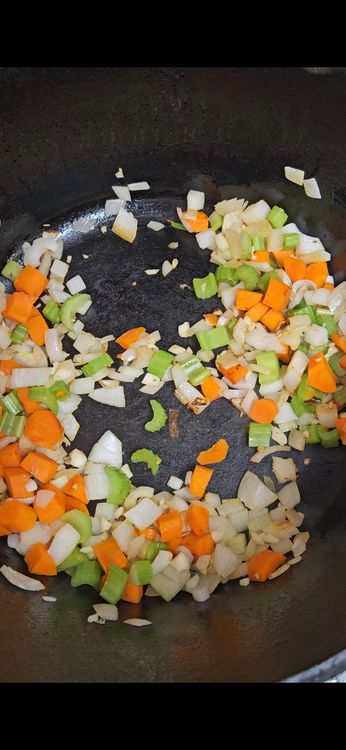 Step 1.1: Heat olive oil in a large pot over medium heat