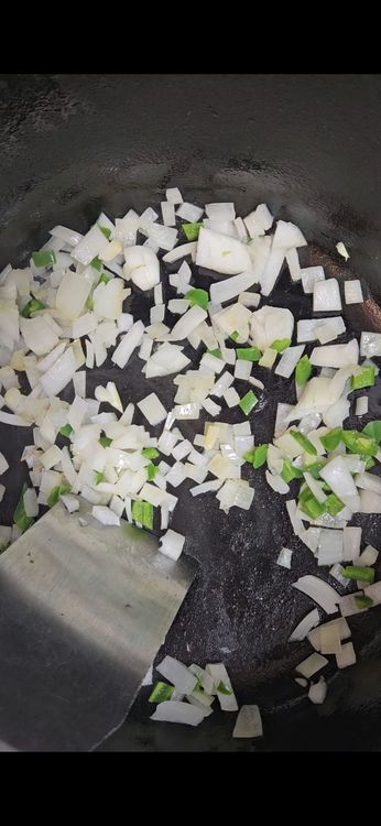 Step 1.1: In a large pot, sauté the onion, jalapeño, and garlic until they are soft