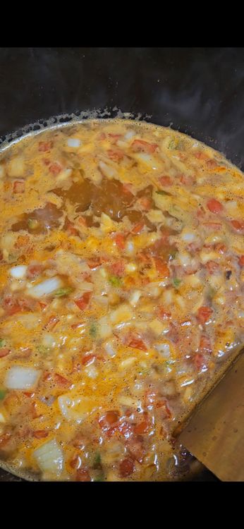 Step 1.1: Stir in the frozen corn, diced tomatoes with green chiles, black beans, chicken broth, and bring to a simmer