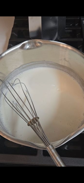 Step 3.1: In a saucepan, whisk together Greek yogurt and cornstarch until smooth