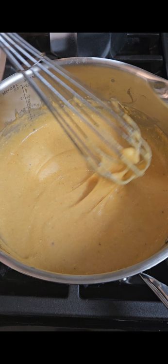 Step 3.1: Add cheddar, mozzarella, garlic powder, onion powder, paprika, cumin, chili powder, salt, and pepper