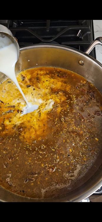 Step 3.2: Pour in chicken broth and jmilk