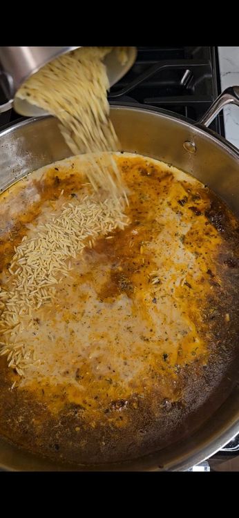 Step 3.1: Stir in orzo and let everything come to a gentle simmer