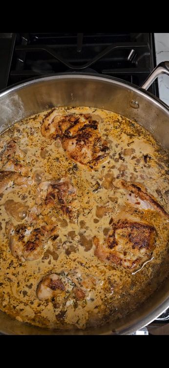 Step 4.1: Cover and let simmer for 10-12 minutes, stirring occasionally, until the orzo is tender and the chicken is cooked through
