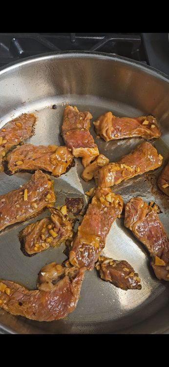 Step 3.1: Brown the marinated steak strips for 1