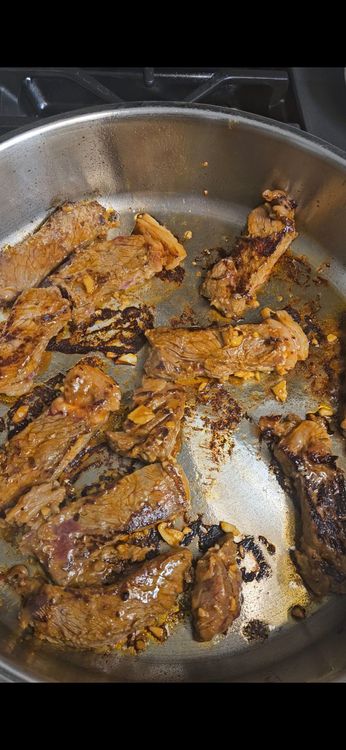 Step 3.2: Brown the marinated steak strips for 1