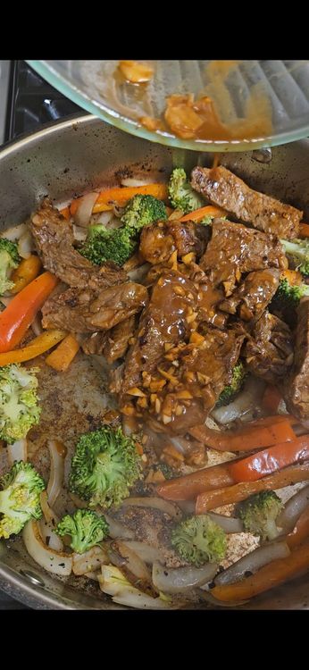 Step 3.1: Add the steak strips back to the pan and pour over any remaining marinade