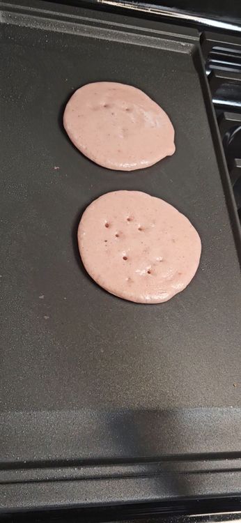 Step 2.1: Cook until bubbles form on the surface and the edges look set, then flip the pancake