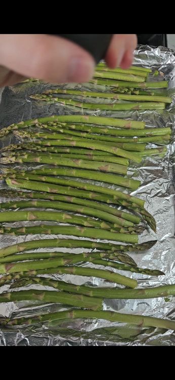 Step 1.1: Place the asparagus on the lined sheet pan