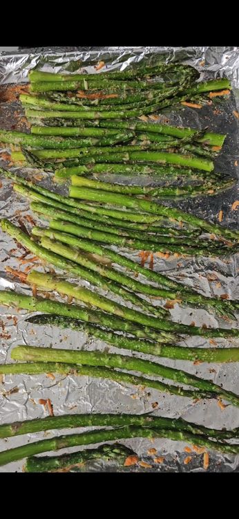 Step 1.1: Roast in the preheated oven for 10-12 minutes until the asparagus is tender and slightly crispy