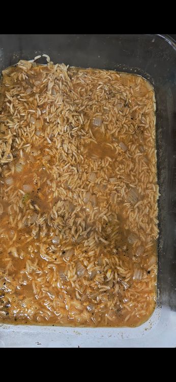 Step 3.1: Either add the browned chicken to the pan and then bake, or add the rice to the pan and then place the browned chicken on top