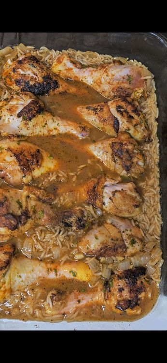 Step 3.2: Either add the browned chicken to the pan and then bake, or add the rice to the pan and then place the browned chicken on top
