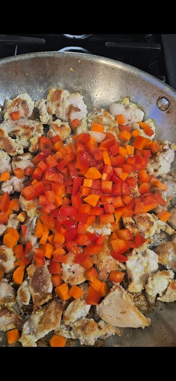 Step 3.1: In the same pan, add the bell pepper and carrot and sauté for 3 to 4 minutes