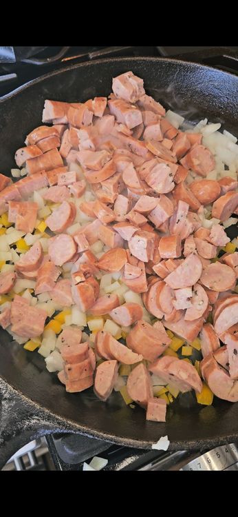 Step 1.1: Add the diced sausage and cook until charred