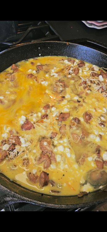Step 1.1: Pour the egg mixture over the top, using a spoon to ensure everything is covered