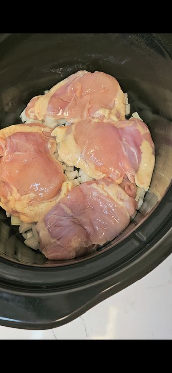 Step 2.1: Arrange the marinated chicken thighs over the vegetables