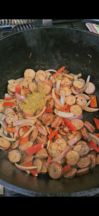 Step 1.1: Stir in the cajun seasoning, diced tomatoes, rice, and chicken bone broth