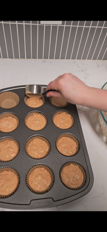 Step 1.1: Pour the batter into cupcake molds, filling them 3/4 of the way full