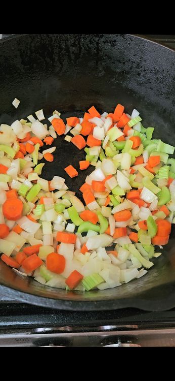 Step 1.1: Heat olive oil in a large Dutch oven or large pot over medium heat
