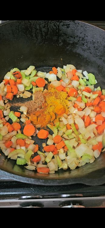 Step 1.1: Stir in curry powder, turmeric, cumin, coriander, chili powder, paprika, salt, and black pepper