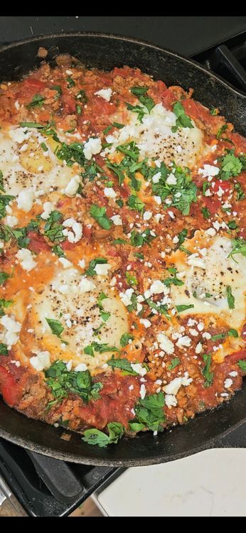 Step 3.1: Garnish with fresh cilantro, parsley, and crumbled feta cheese before serving