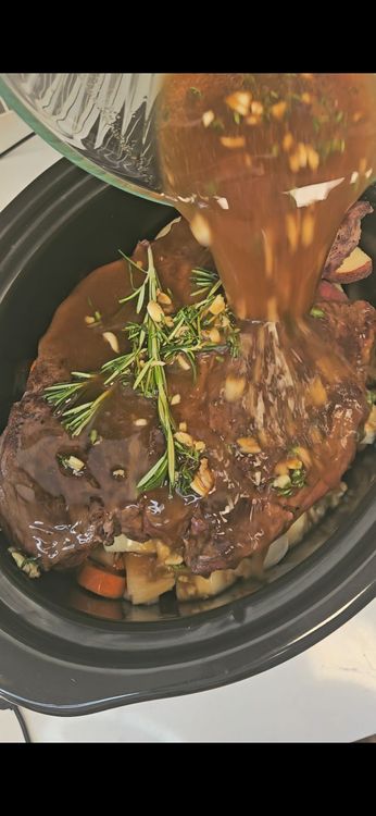 Step 4.1: Pour the prepared broth/seasoning mixture evenly over the meat and vegetables