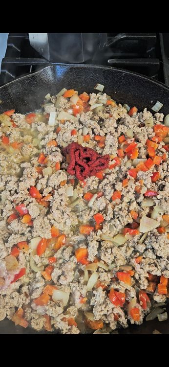 Step 1.1: Add tomato paste, chili powder, chicken bone broth, soy sauce, and protein pasta