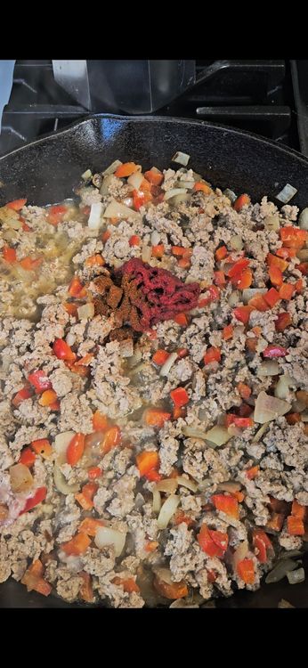 Step 1.2: Add tomato paste, chili powder, chicken bone broth, soy sauce, and protein pasta