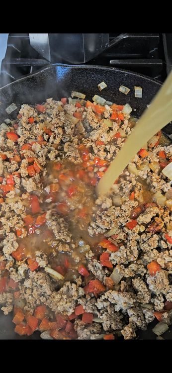 Step 1.3: Add tomato paste, chili powder, chicken bone broth, soy sauce, and protein pasta
